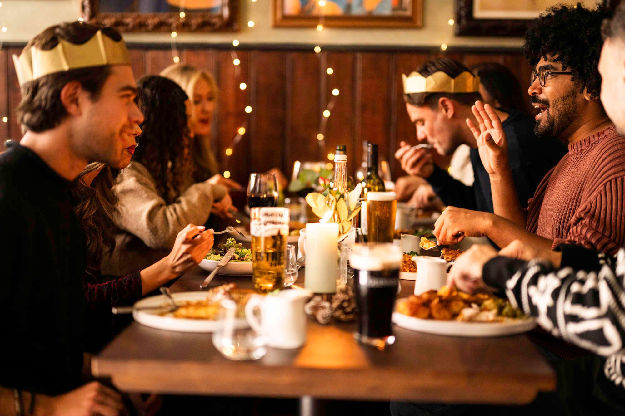 Friends celebrating a Christmas party at Bath Brew House